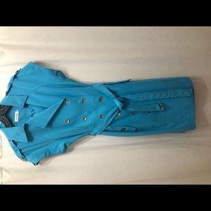 Calvin Klein size 6 Turquoise dress with gold button detail.